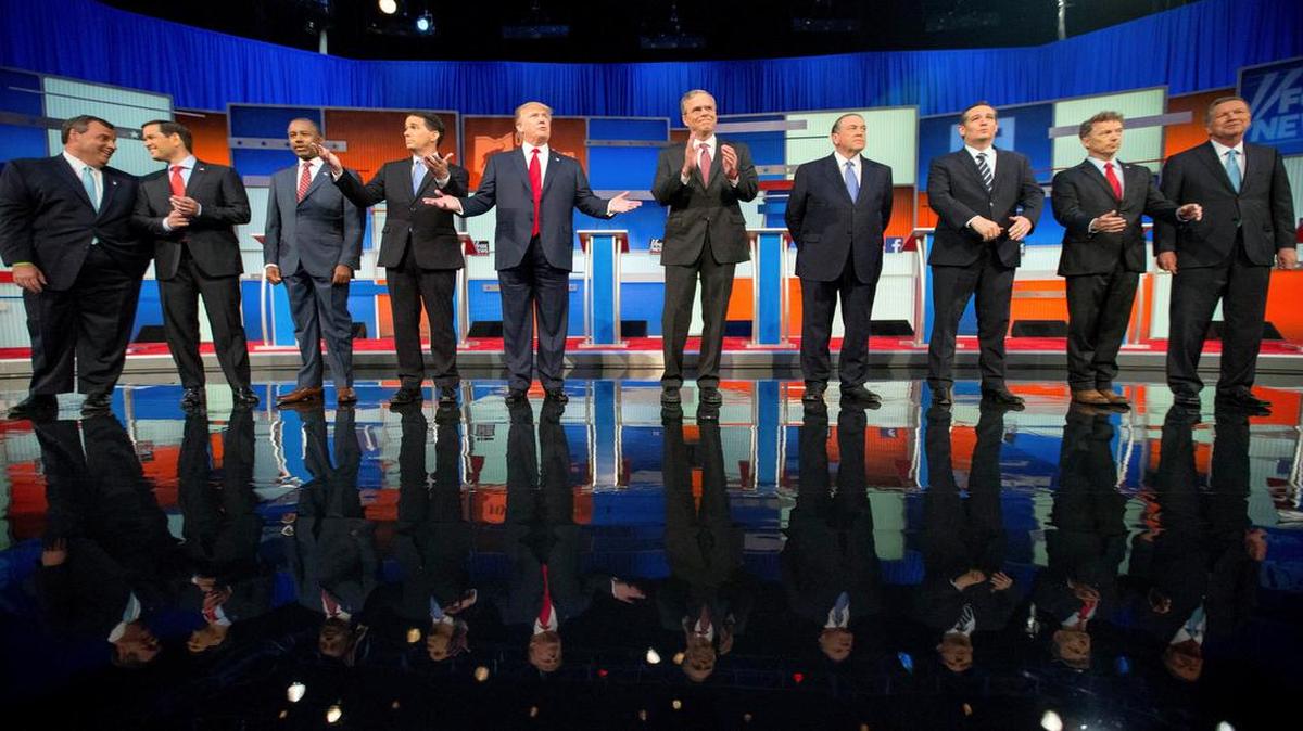 
Republican presidential candidates from left, Chris Christie, Marco Rubio, Ben Carson, Scott Walker, Donald Trump, Jeb Bush, Mike Huckabee, Ted Cruz, Rand Paul, and John Kasich take the stage for the first Republican presidential debate at the Quicken Loans Arena, Thursday in Cleveland.
