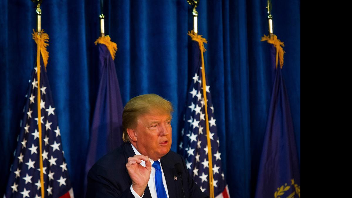 
Republican presidential candidate Donald Trump speaks during a rally at Manchester Community College in Manchester, N.H., on Wednesday.
