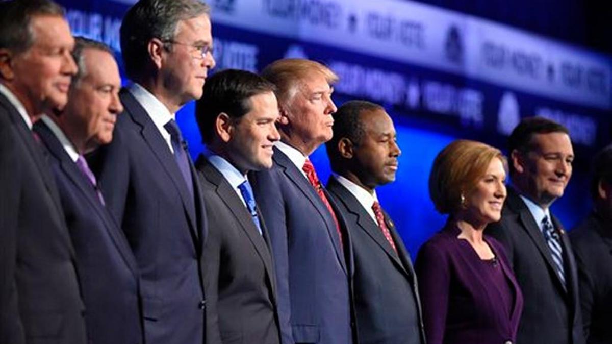 Republican presidential candidates, from left, John Kasich, Mike Huckabee, Jeb Bush, Marco Rubio, Donald Trump, Ben Carson, Carly Fiorina, and Ted Cruz