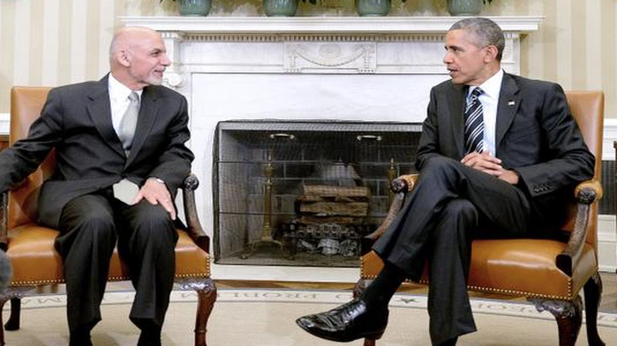 
President Barack Obama speaks with Afghan President Ashraf Ghani during a restricted bilateral meeting in the Oval Office Tuesday
