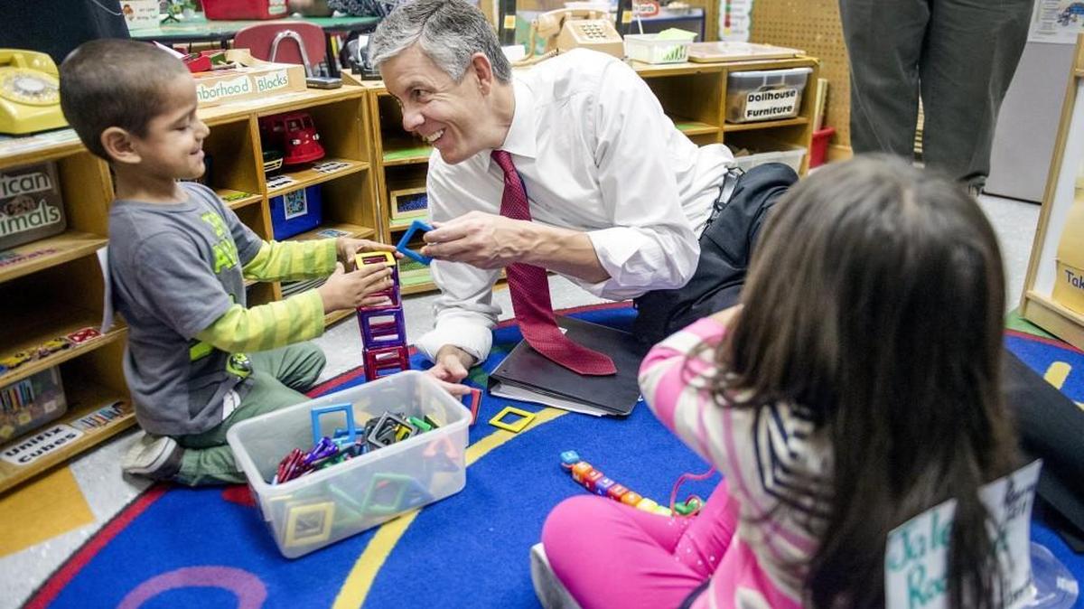 
U.S. Education Secretary Arne Duncan talked with 3-year-old Cristian Rodriguez (left) and 4-year-old Jalena Rodriguez (no relation) on Monday at the Woodland Early Learning Center, 711 Woodland Ave. in Kansas City. 
