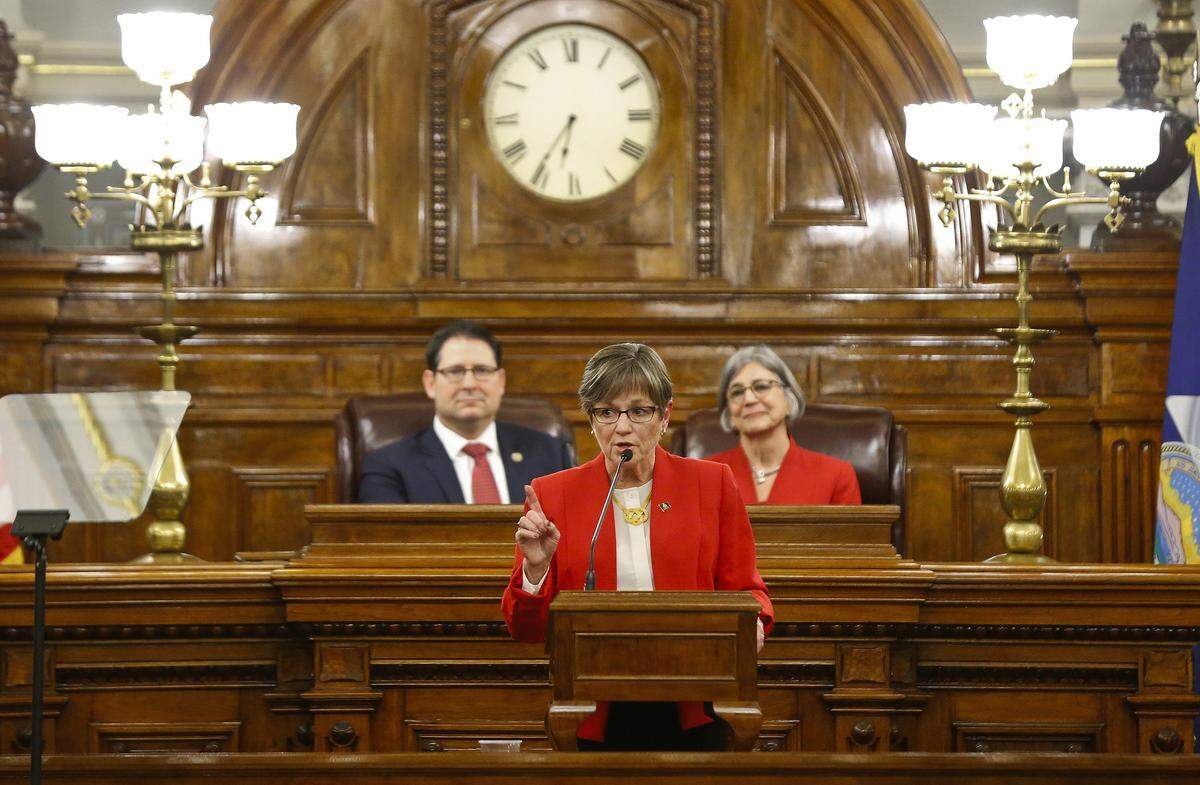 Kansas Gov. Laura Kelly gives her first State of the State address to lawmakers on the floor of the Kansas House on Wednesday, Jan. 16, 2019, in Topeka, Kan. (Chris Neal/The Topeka Capital-Journal via AP)