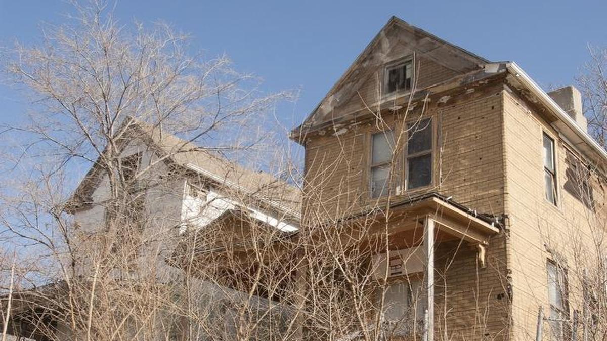 Mayor Sly James and City Manager Troy Schulte unveiled a budget proposal that calls for spending $10 million over the next two years to knock down 870 of the city’s most dangerous buildings, including several in the 2300 block of Chestnut Avenue.