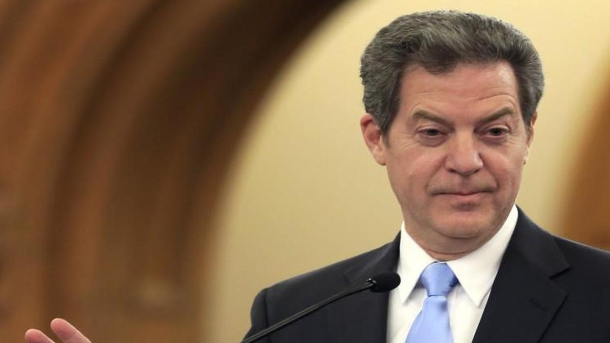 Kansas Gov. Sam Brownback signed 11 bills into law Tuesday.