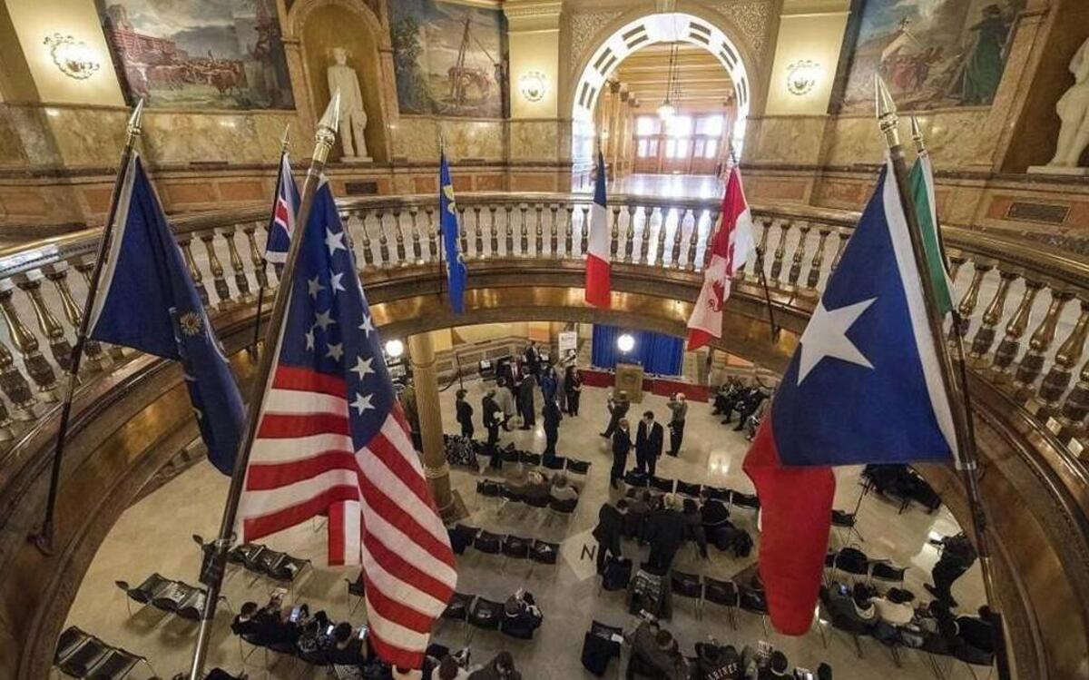 The Kansas House gave initial approval to a tax bill Wednesday that would raise income tax rates and end a tax cut for roughly 330,000 business owners. A final vote in the House could come Thursday. (This is the rotunda of the Kansas Capitol.)