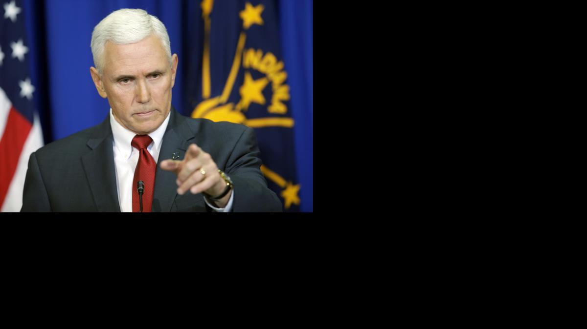 
Indiana Gov. Mike Pence takes a question during a news conference Tuesday.
