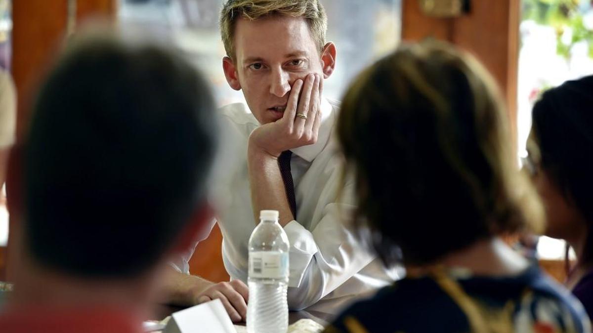 Jason Kander, candidate for U.S. Senate, listened to small business owners in St. Joseph in September.