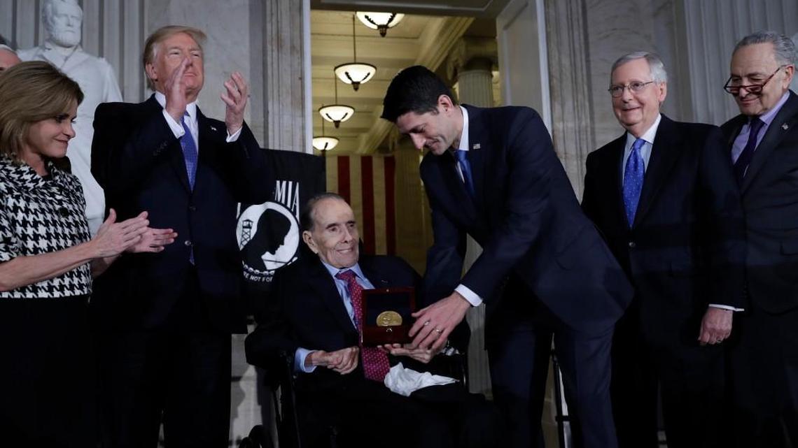 House Speaker Paul Ryan presented the Congressional Gold Medal on Wednesday to former Sen. Bob Dole. Watching from left were Rep. Lynn Jenkins of Kansas, President Donald Trump, Senate Majority Leader Mitch McConnell and Senate Minority Leader Chuck Schumer.