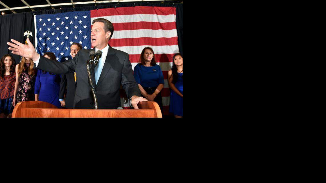 Gov. Sam Brownback, who made his re-election victory speech last Tuesday in Topeka, now faces new criticism over his tax policies.