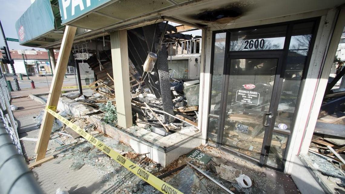 The building that housed a Speedy Cash store at 2600 Independence Blvd. in Kansas City was damaged in the October fire that killed two firefighters and destroyed the building where the blaze started. The payday loan company is fighting to keep the building from being demolished.