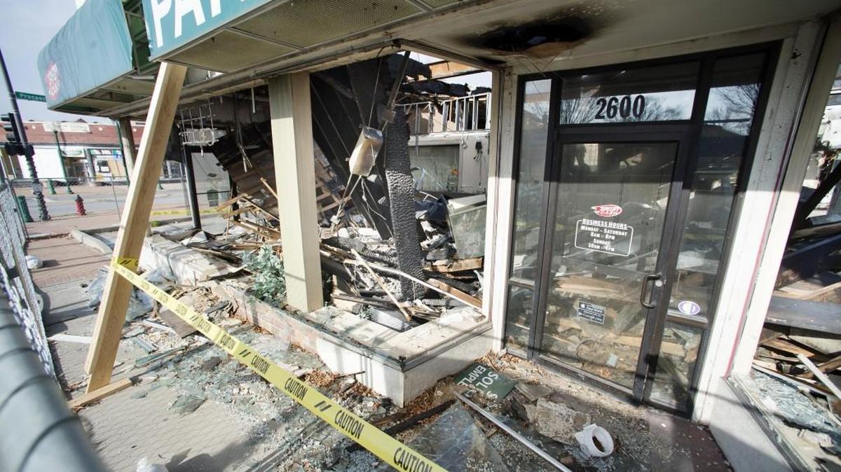 The building that housed a Speedy Cash store at 2600 Independence Blvd. in Kansas City was damaged in the October fire that killed two firefighters and destroyed the building where the blaze started. The payday loan company is fighting to keep the building from being demolished.