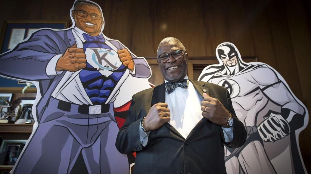 Kansas City Mayor Sly James his and 8-foot 'Super Mayor James’ created for Kansas City Comic Con earlier this month.