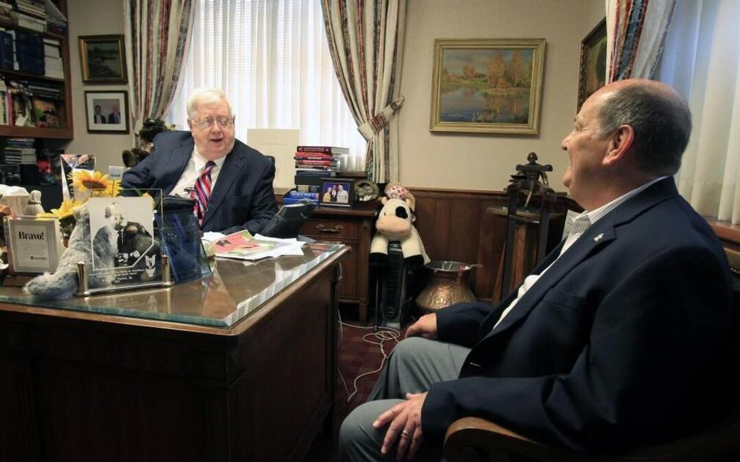 Randall O’Donnell (right), CEO of Children’s Mercy Hospital, drops by Nutter’s office. Nutter has served on the hospital’s board and is a major benefactor.