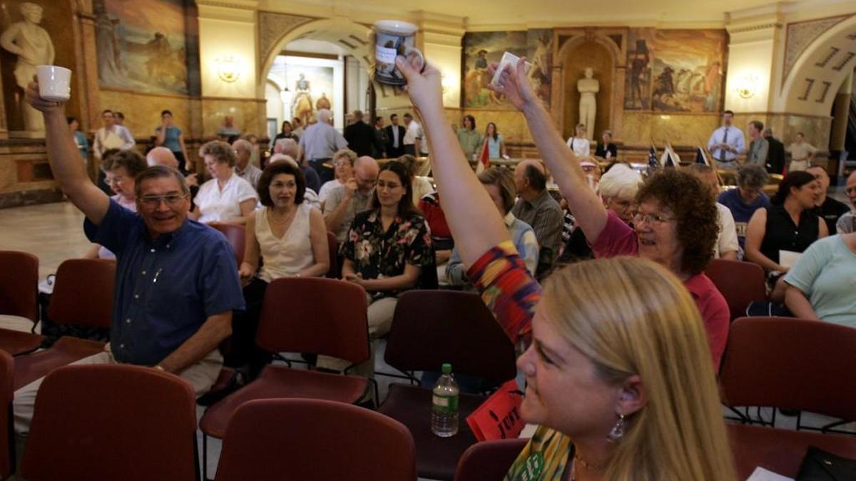 In 2005, protesters gathered in the Kansas Capitol to oppose a state Supreme Court order to increase aid for public schools.