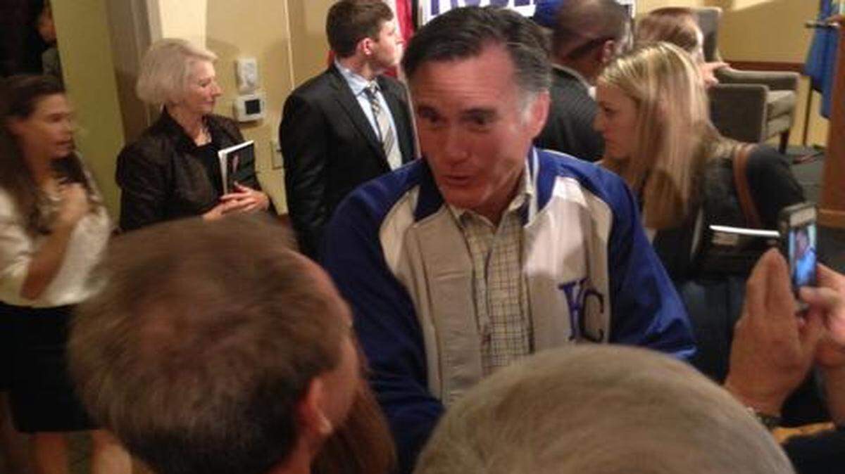 
Wearing a Kansas City Royals jacket, Mitt Romney, the Republican presidential nominee in 2012, campaigned Monday in Overland Park for Sen. Pat Roberts and Kansas Gov. Sam Brownback, both of whom are facing strong challenges in their bids for re-election. Former Sen. Bob Dole of Kansas also appeared at the rally.
