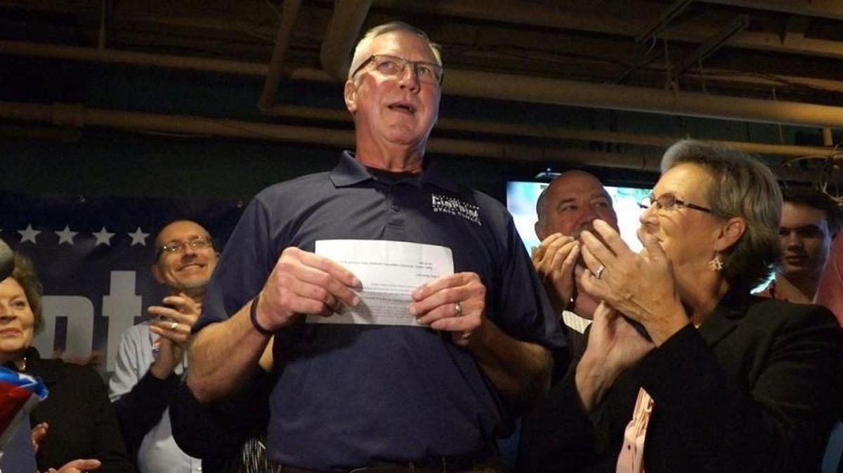 Two political action committees spent more than $400,000 in October on television ads aimed at boosting Republican state Senate candidate Mike Cierpiot and attacking his Democratic opponent. Tuesday night, Cierpiot (center) spoke to supporters after winning election.