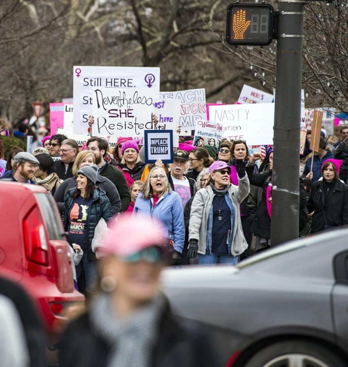 Signs carried many familiar messages of protest: “Respect My Existence or Expect My Resistance,” “Nevertheless We Persist,” “Gun Violence is a Women’s Issue,” “Super Callous Fragile Racist Sexist Nazi Potus.”