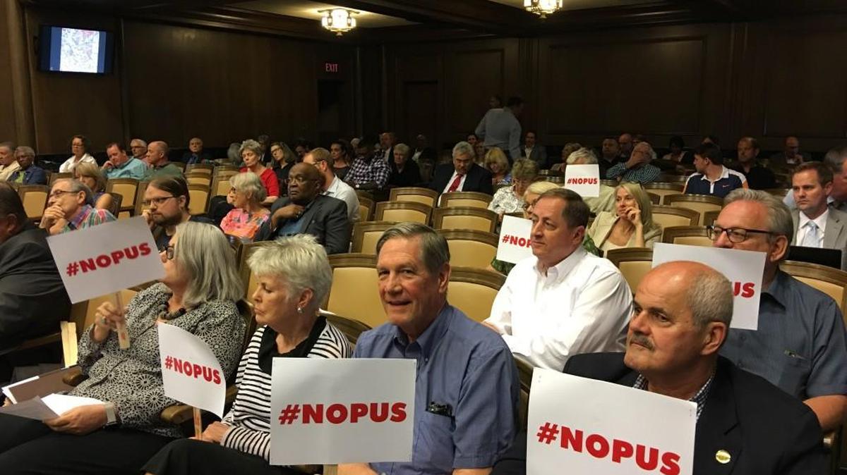 Last summer some Westport residents and others protested the Opus apartment project, which will include a multilevel parking garage and ground-floor retail. It would replace an old building now occupied by a Bank of America branch and surface parking lot in the heart of the district. The Kansas City Council approved the project in June.