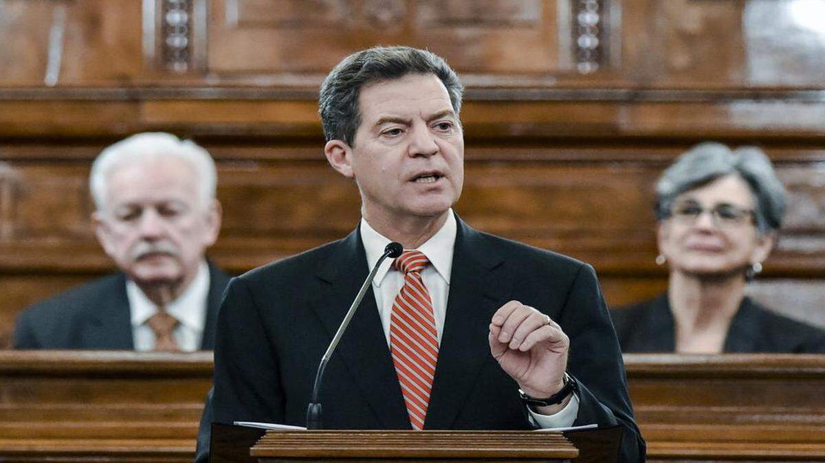 
Gov. Sam Brownback, seen here in January, wants to work with Aetna about its concerns about the HMO tax, which the company said could swell premiums for Kansans. 

 
