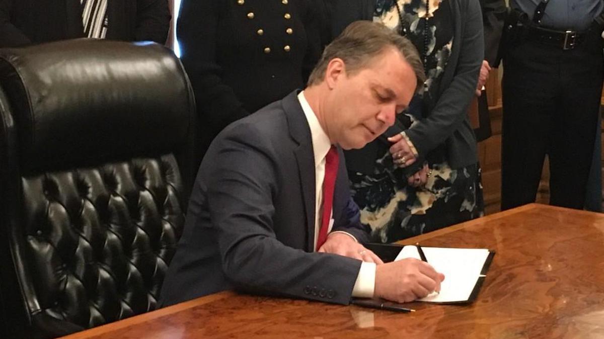 Gov. Jeff Colyer on Monday signed his first executive order, mandating sexual harassment training each year for all executive branch employees.