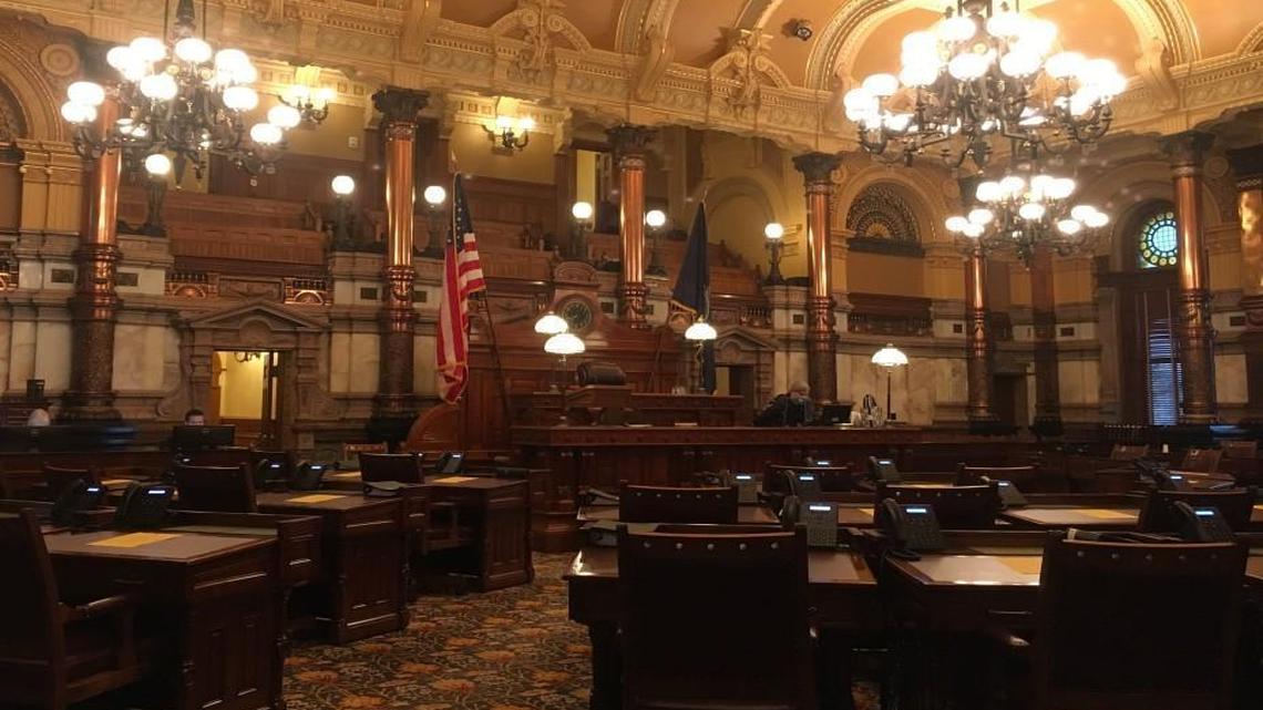 The Kansas Senate chambers were empty Thursday morning as members met elsewhere to discuss legislation that would cut the budget and raise taxes to solve the state’s budget shortfall.