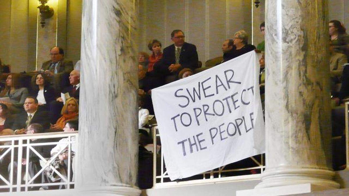 
Protestors of the police killing of an unarmed black man in Ferguson, Mo., briefly shut down the Missouri Senate on Wednesday in Jefferson City. Demonstrators vowed to return to the Capitol.

