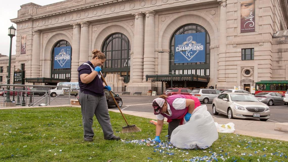 A day after the big rally at Union Station, blue and white confetti was cleaned up Wednesday by Elena Ceja (left) and Concepcion Salva.