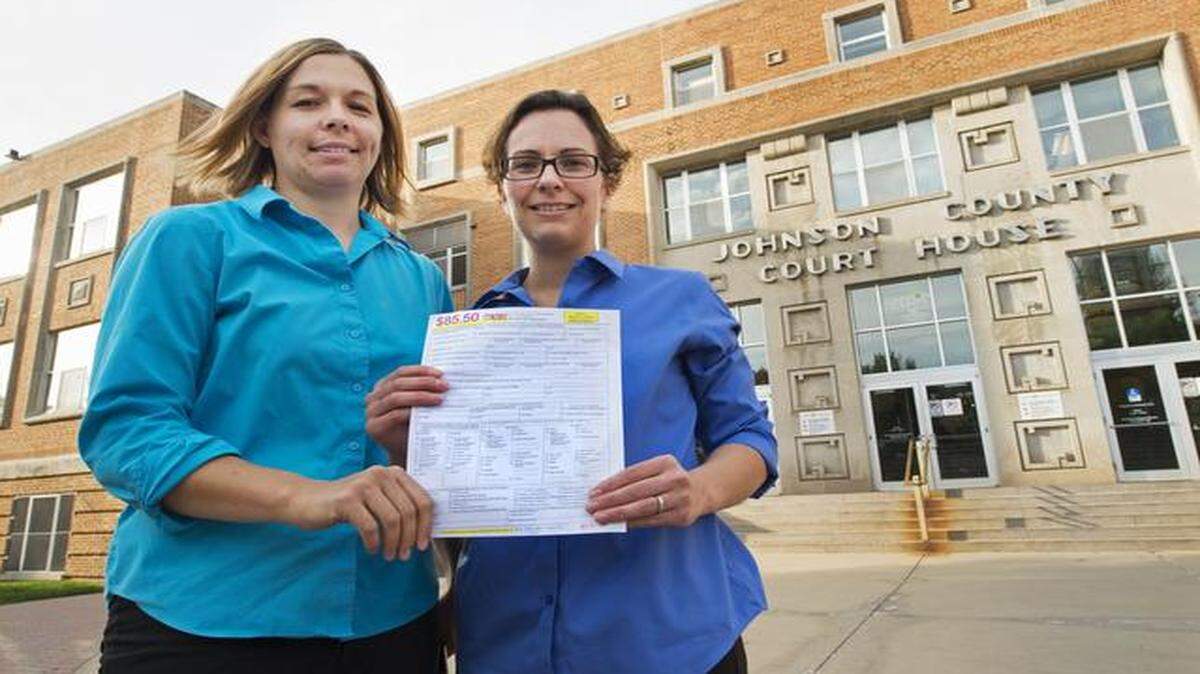 
Angela Schaefer, 31, and longtime partner Jennifer Schaefer, 28, got a application for a marriage license last month at the clerk’s office at the Johnson County Courthouse in Olathe. 
