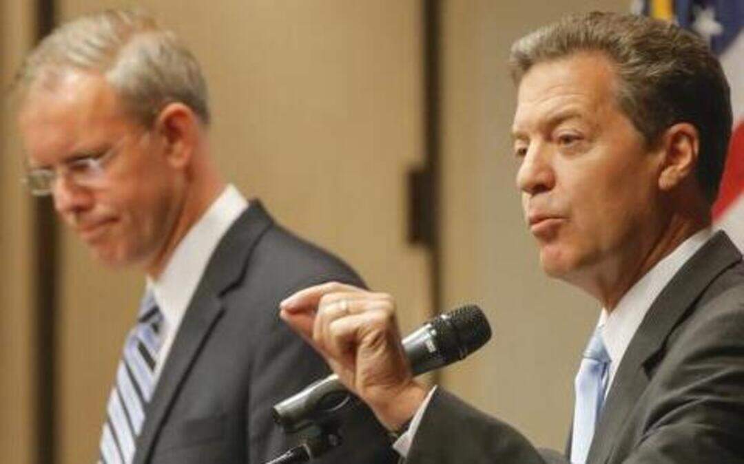 
Democratic gubernatorial hopeful Paul Davis (left) had a good couple of months raising money, about doubling what he raised previously. And he still couldn’t match the outside money coming into Kansas to help Republican Gov. Sam Brownback win a second term.
