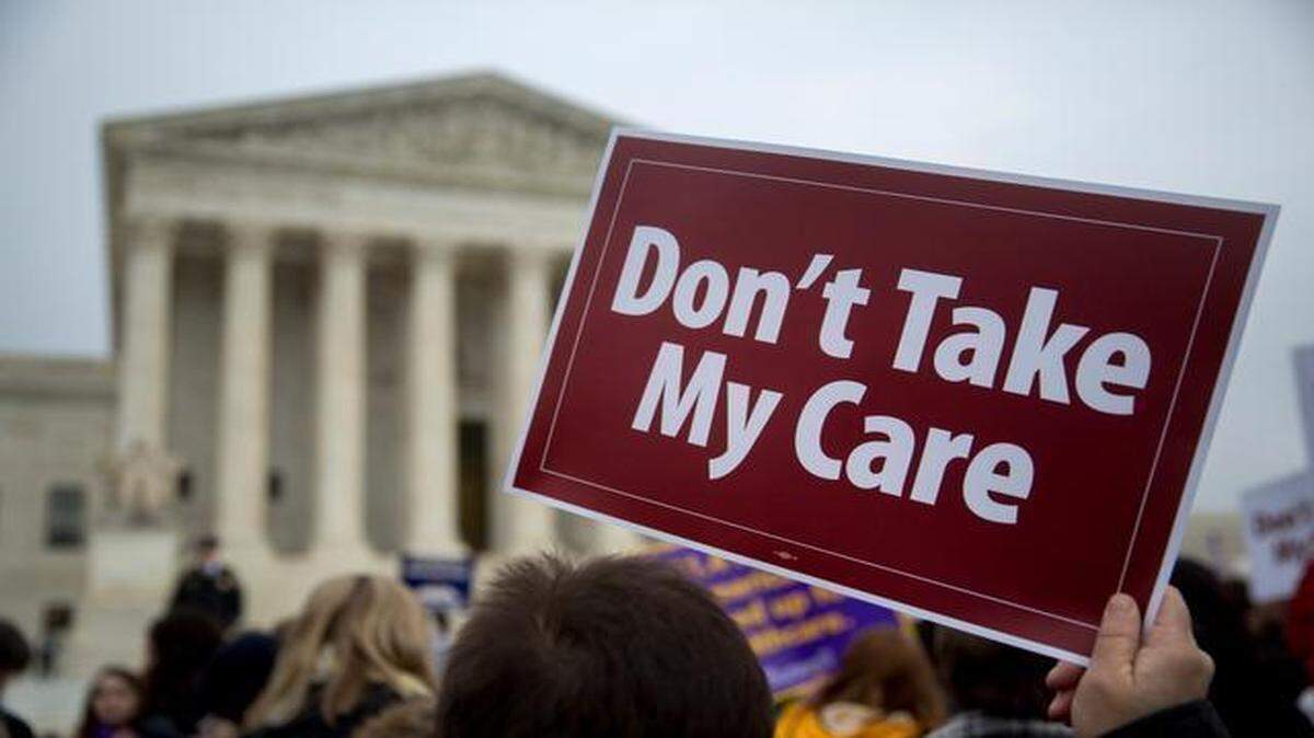 
Demonstrators gathered outside the U.S. Supreme Court the day of arguments in a lawsuit challenging premium subsidies included in the Affordable Care Act.

