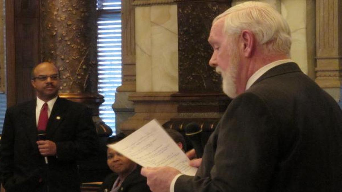 
Kansas state Sen. David Haley, left, and Sen. Steve Fitzgerald, right, R-Leavenworth, debate a bill aimed at protecting religious groups on state college campuses 
