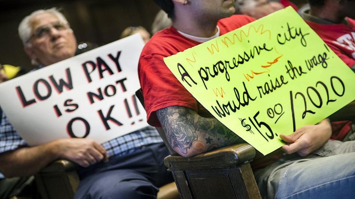 
People in Kansas City have joined a nationwide push to increase minimum wage to $15 per hour by 2020. Alex Bay (left) of Edgerton, Mo., and Austin Hoffman of Kansas City joined others in favor of such a change Thursday at City Hall, where the City Council set up a vote on a proposal to boost wages — but not to $15 per hour. 


