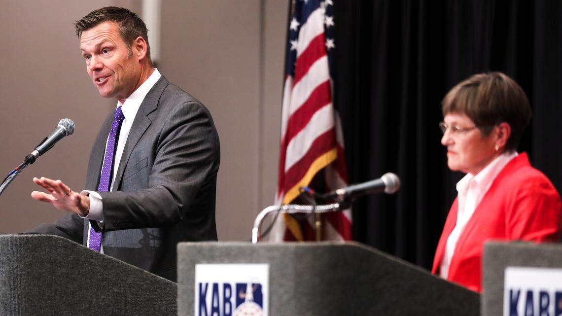 Republican Kris Kobach and Democrat Laura Kelly debate in the Kansas governor’s race in October 2018. Four years later, some Kansas lawmakers want to remove Gov. Kelly’s authority over the Kansas Highway Patrol and place it under state Attorney General-elect Kris Kobach if Kelly doesn’t replace the agency’s current leadership.