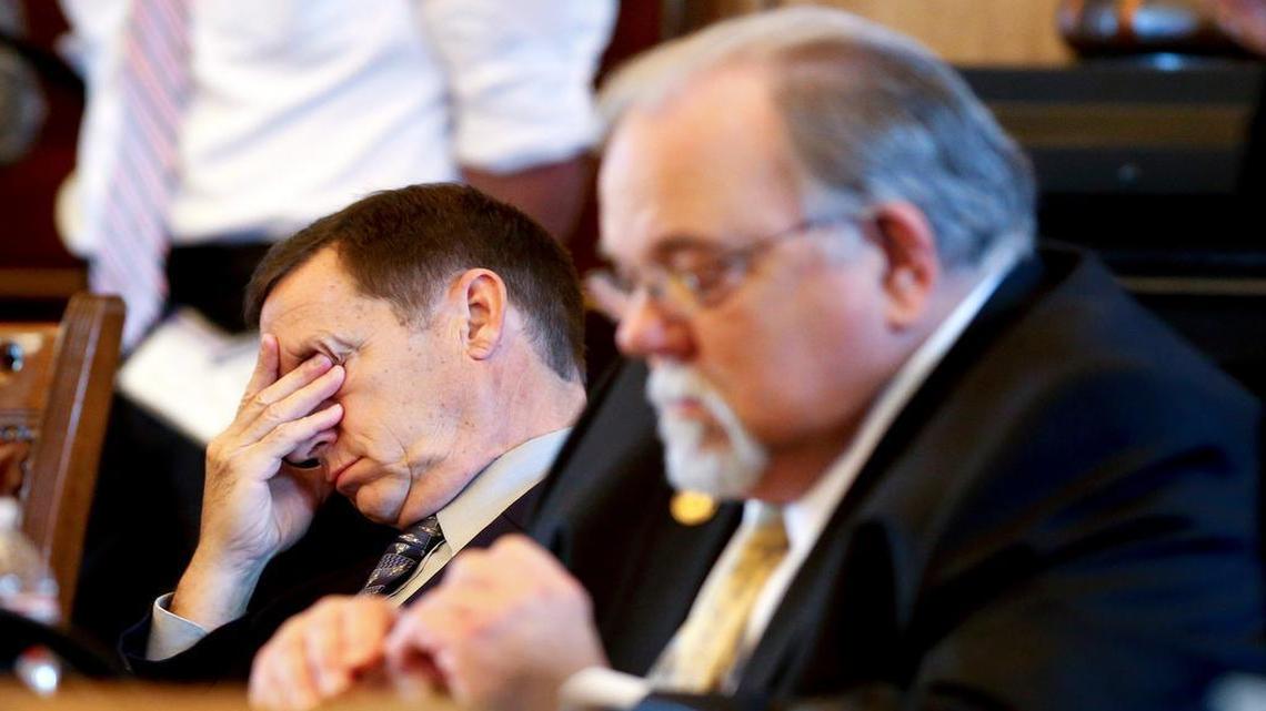 
Sen. Dennis Pyle, a Hiawatha Republican, rubbed his eyes Saturday as he and Sen. Steve Abrams, an Arkansas City Republican, listened to a tax debate.

