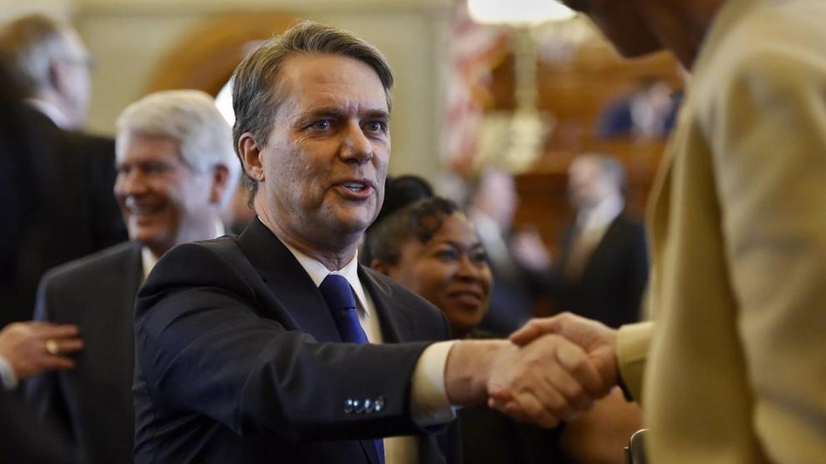 Gov. Jeff Colyer shook hands with lawmakers after giving his first joint address to the Kansas Legislature on Feb. 7.