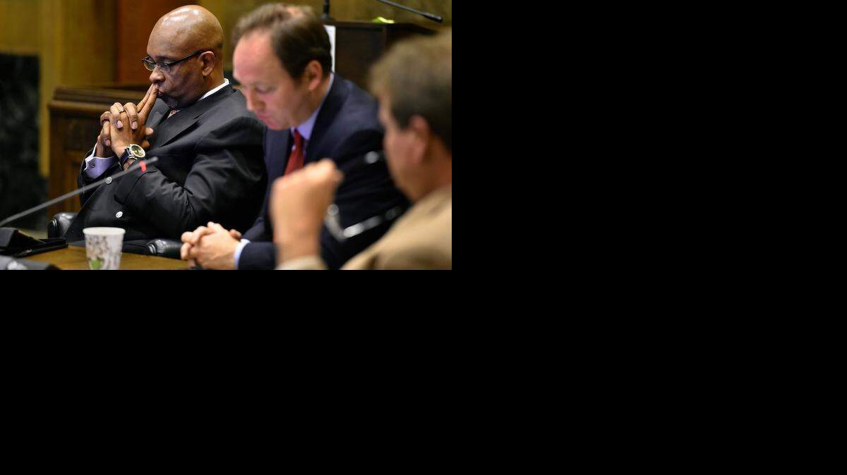 
Kansas City Councilman Michael Brooks (left) said he thought it was in everyone’s best interest that he hand in his resignation Wednesday. He appeared to be deep in thought Wednesday at a Public Safety & Emergency Services Committee meeting at City Hall as he listened to Councilman Scott Taylor (center).
