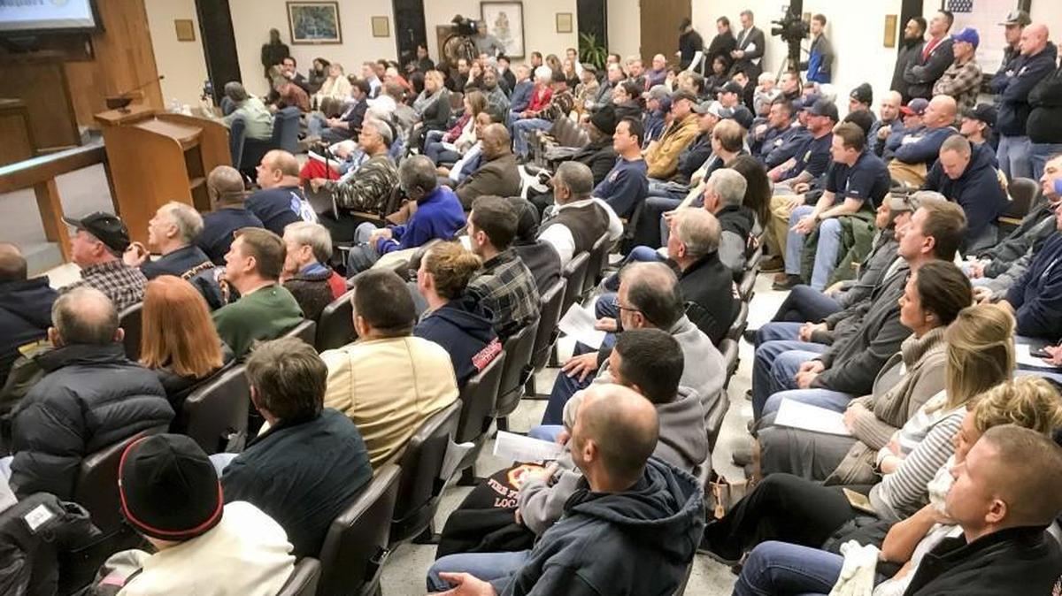 Mark Holland held a special meeting of the Unified Government Board of Commissioners on Jan. 4, 2018, in Kansas City, Kansas, to discuss the results of a fire fighter shift trading analysis that found fire fighters were being paid for work they didn't do. A quorum was not possible due to a boycott of the meeting by several commissioners.