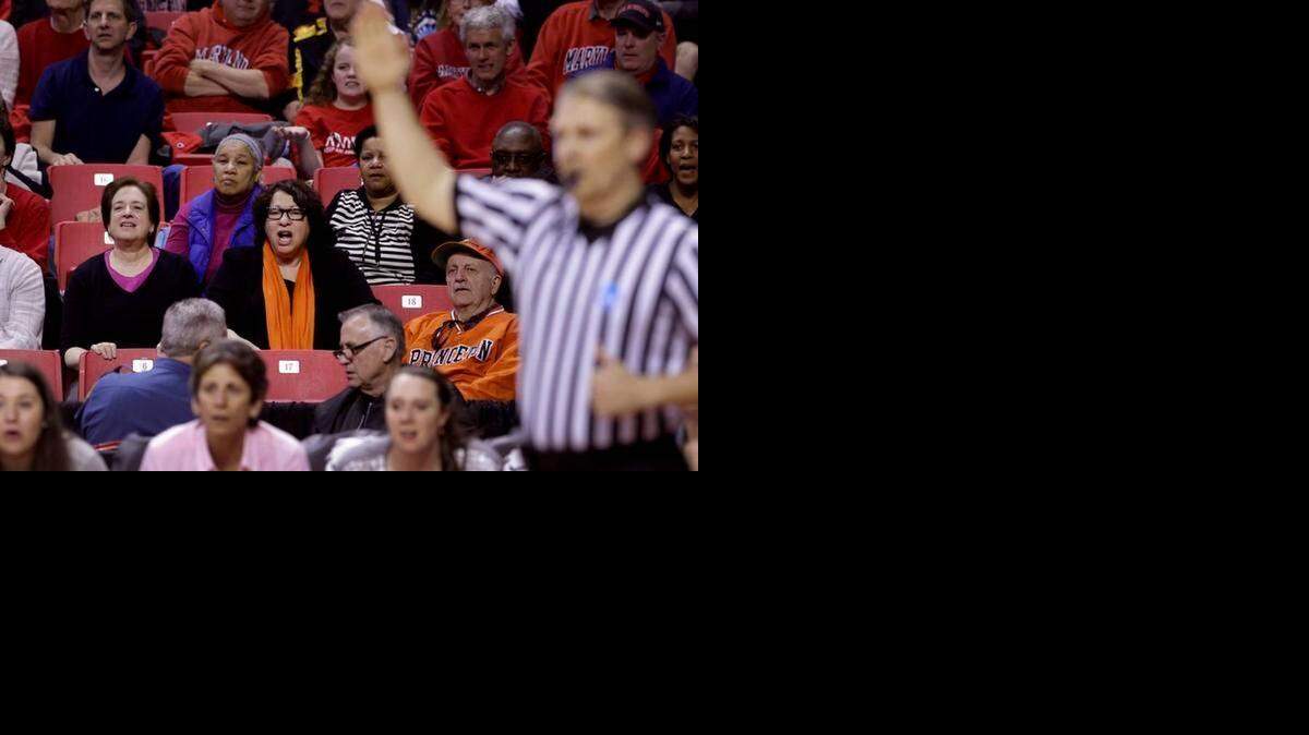 
U.S. Supreme Court Associate Justices Elena Kagan, at left in black and purple, and Sonia Sotomayor watch the second half of an NCAA college basketball game between Princeton and Maryland in the second round of the NCAA tournament, Monday in College Park, Md.
