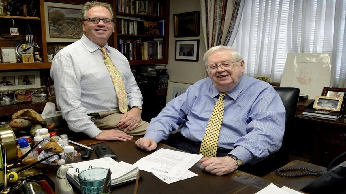 James Nutter Jr., left, and his father, the late James Nutter,. built one of the largest privately held mortgage companies in the United States.