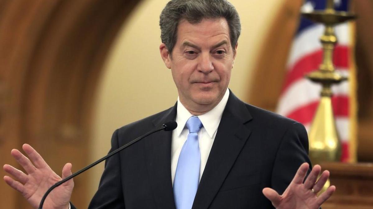 With his nomination for a Trump administration post back at square one, Kansas Gov. Sam Brownback will continue to perform the duties of the state’s highest office.