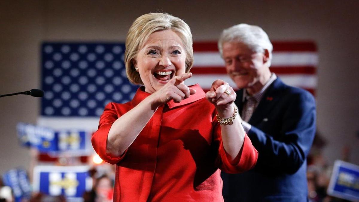 Hillary Clinton had reason to smile Saturday in Las Vegas as she edged her way into the front-runner position with a win in the Nevada Democratic caucus.