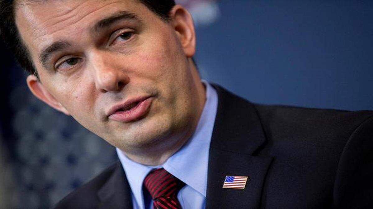 
Gov. Scott Walker of Wisconsin spoke Friday during a panel discussion at the American Action Forum in Washington. Walker last week announced the formation of a new committee to explore his presidential options dubbed "Our American Revival," the latest clue as to whether Walker will seek the Republican Party nomination.
