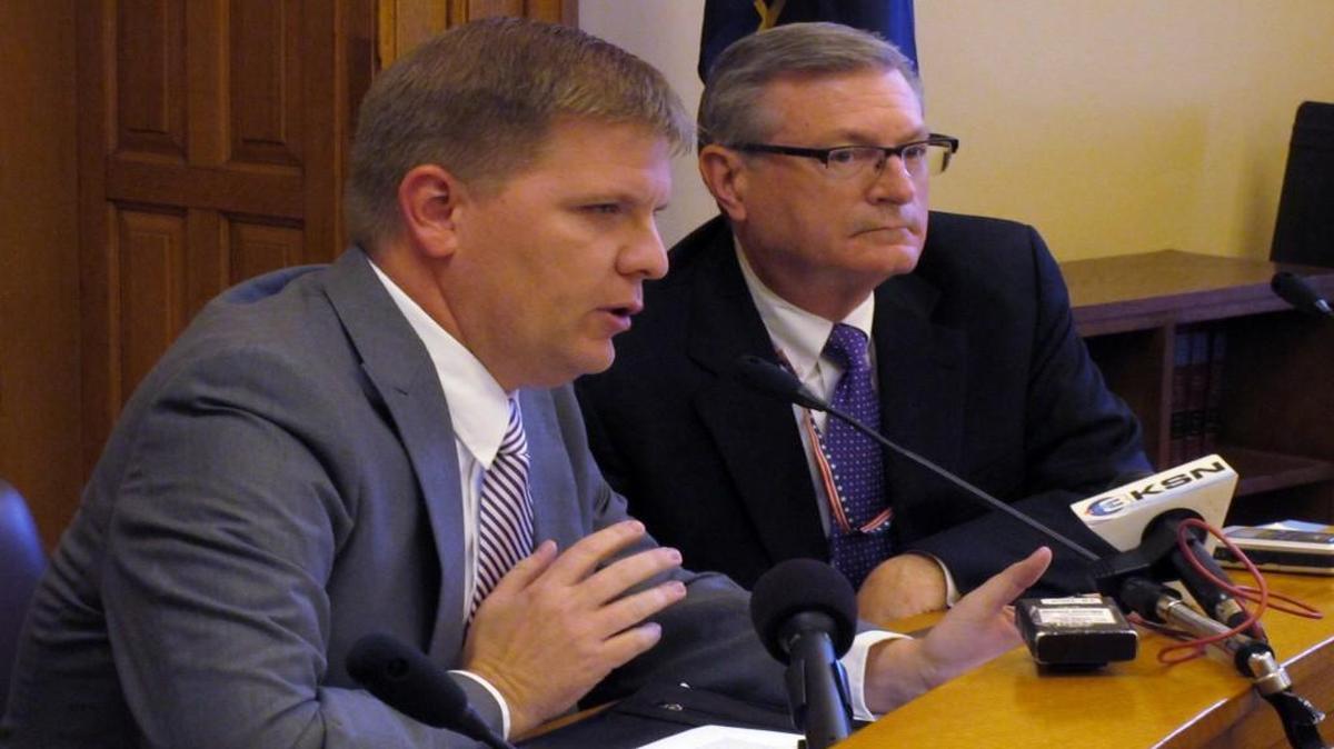When Kansas budget director Shawn Sullivan (left) announced adjustments to the state’s budget last week, he said the move of $9 million from the Children’s Initiatives Fund to bolster the general fund would not affect programs this year. The group Kansas Action for Children said Thursday that is not the case.