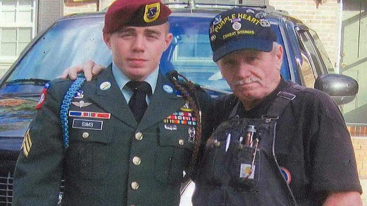 
Issac Sims and his father, Adrian Sims.
