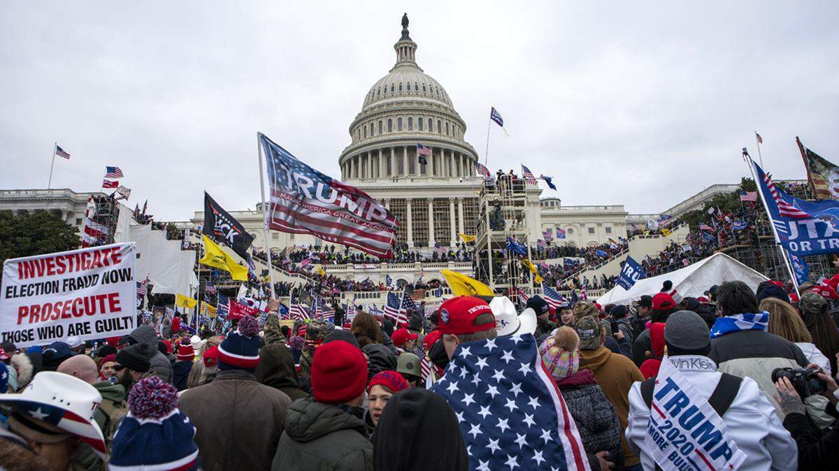 FILE - In this Jan. 6, 2021, file photo, insurrectionists loyal to Donald Trump rally at the U.S. Capitol in Washington, D.C.