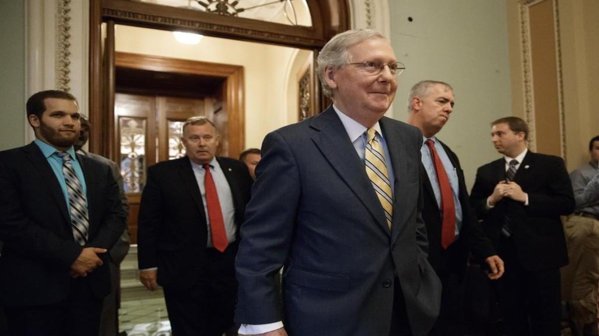 Senate Majority Leader Mitch McConnell of Kentucky is seen Thursday leaving the Senate chamber on Capitol Hill after announcing the revised version of the Republican health care bill.