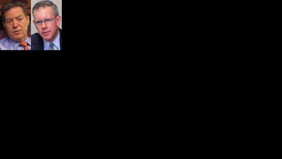 
Republican Kansas Gov. Sam Brownback (left) and Democrat Paul Davis are running neck-and-neck in a new poll.
