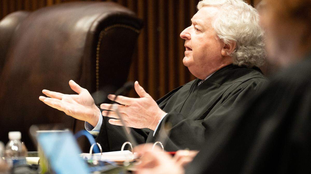 Kansas Supreme Court Justice Dan Biles questions Kansas Solicitor General Anthony Powell presented during Monday’s oral arguments on abortion. (Pool Photo by Evert Nelson/The Capital-Journal)