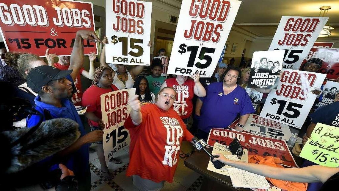 
The Kansas City Council voted in July for a minimum wage increase that calls for $13 per hour by 2020. After the vote, Dana Wittman of Stand Up KC led the cheers just outside the council chambers.
