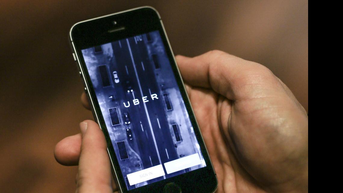 
Uber and similar services use smartphone apps to link people wanting a ride to private drivers who are willing to drive them. The passengers pay a fee to the ride-hailing service, which then pays the drivers.

